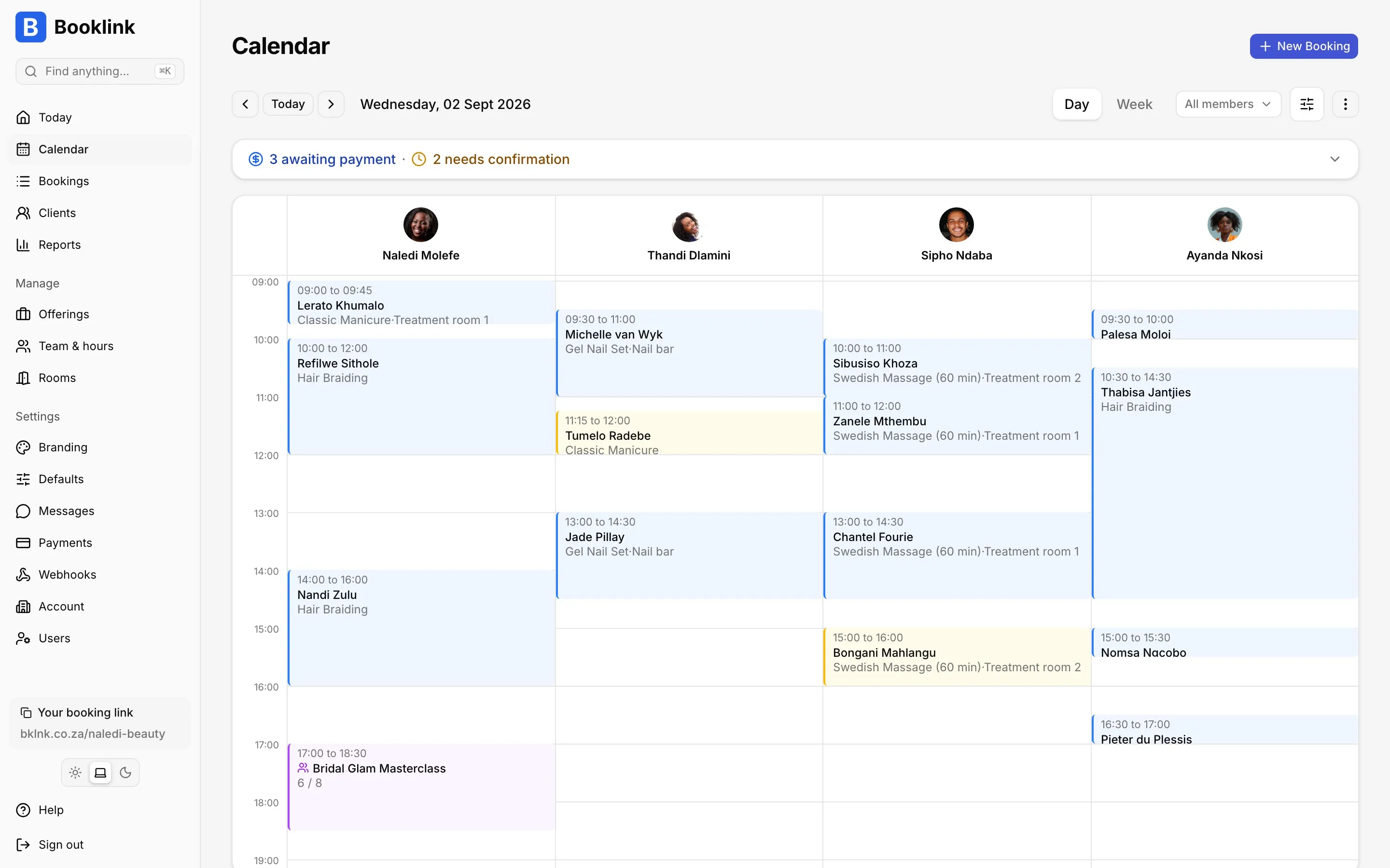 Booklink calendar day view with a column for each of four team members, bookings labelled with the service and the room they hold, and a group class at 17:00 with six of eight seats taken